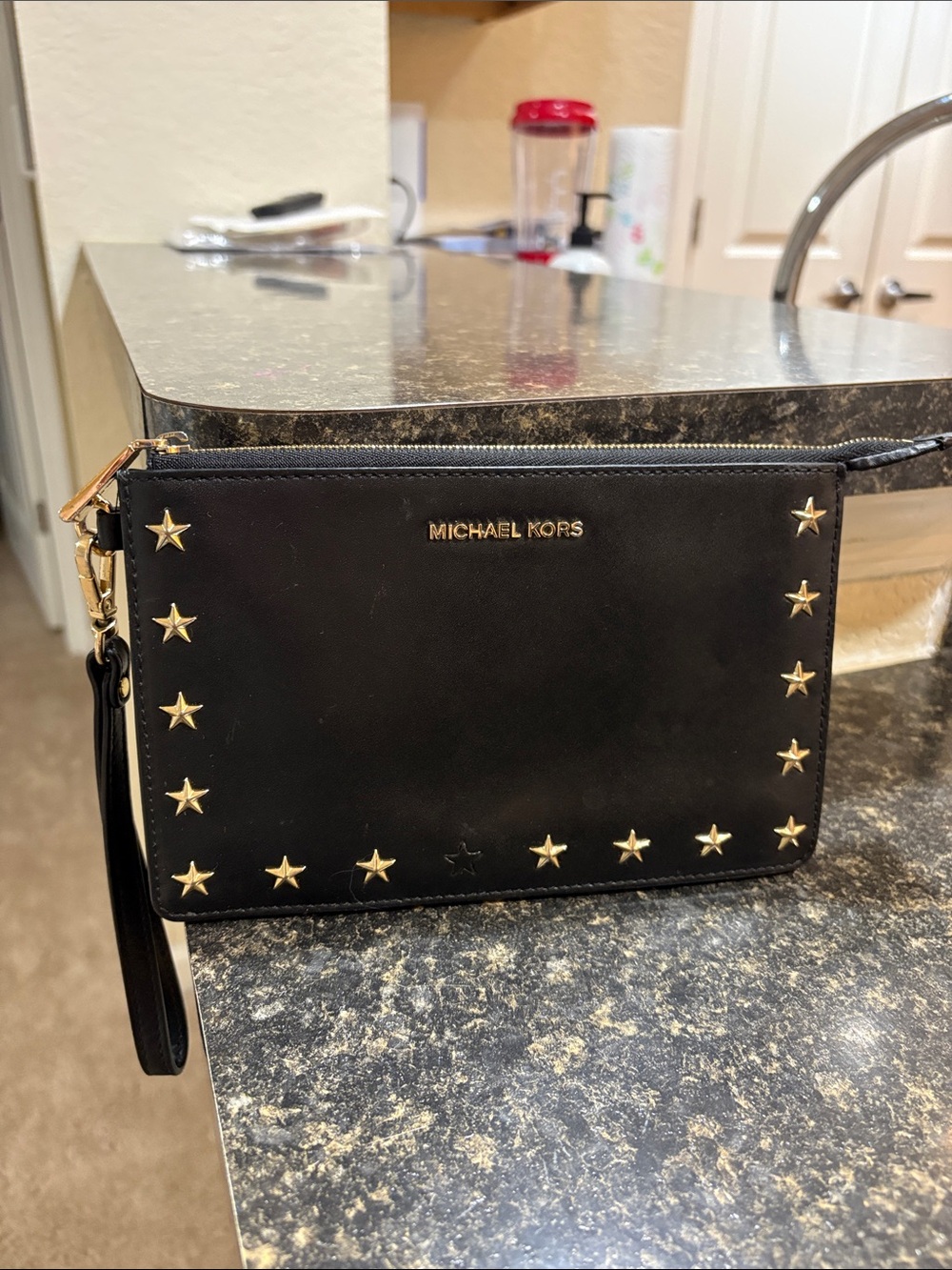 Michael Kors Black Leather Star-Studded Wristlet with Gold Accents